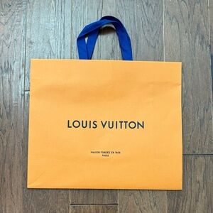 Louis Vuitton Bold Orange Bag with Blue Handles